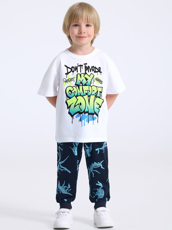 Апрель Брюки 568829 1ПБМ4644001н скелеты динозавров на темно-синем+темно-синий