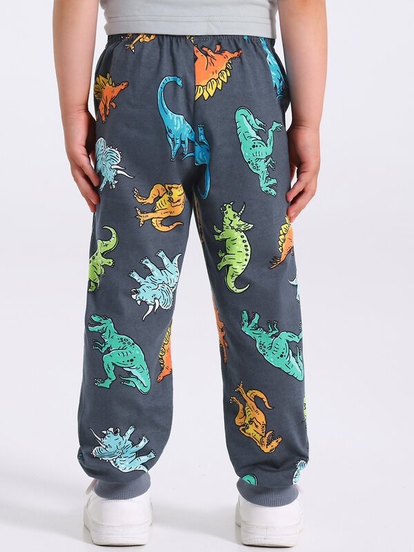 Апрель Брюки 581641 1ПБМ4644001н цветные фигурки динозавров на темно-сером+темно-серый